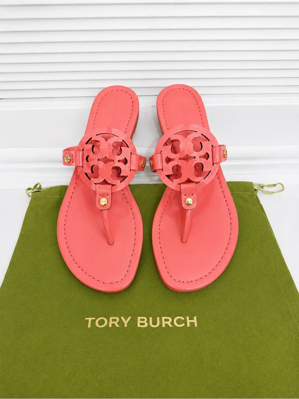 NWT Size 8 Tory Burch⁠ Miller Patent Leather sandals in Coral Crush Pink.